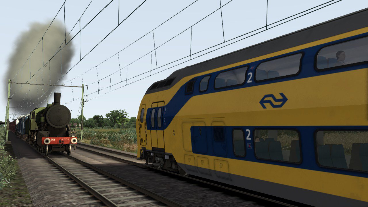 VIRM naar Vlissingen treft NS4300 van de SGB aan tijdens een proefrit van Sloe naar Goes