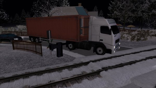 Vrachtwagen rijdt door spoorboom!