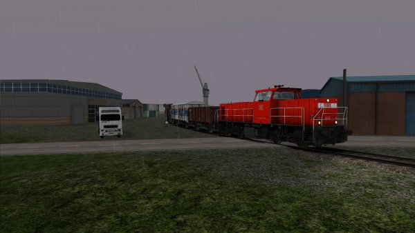 DB Cargo 6400 met een goederentrein in Veddel