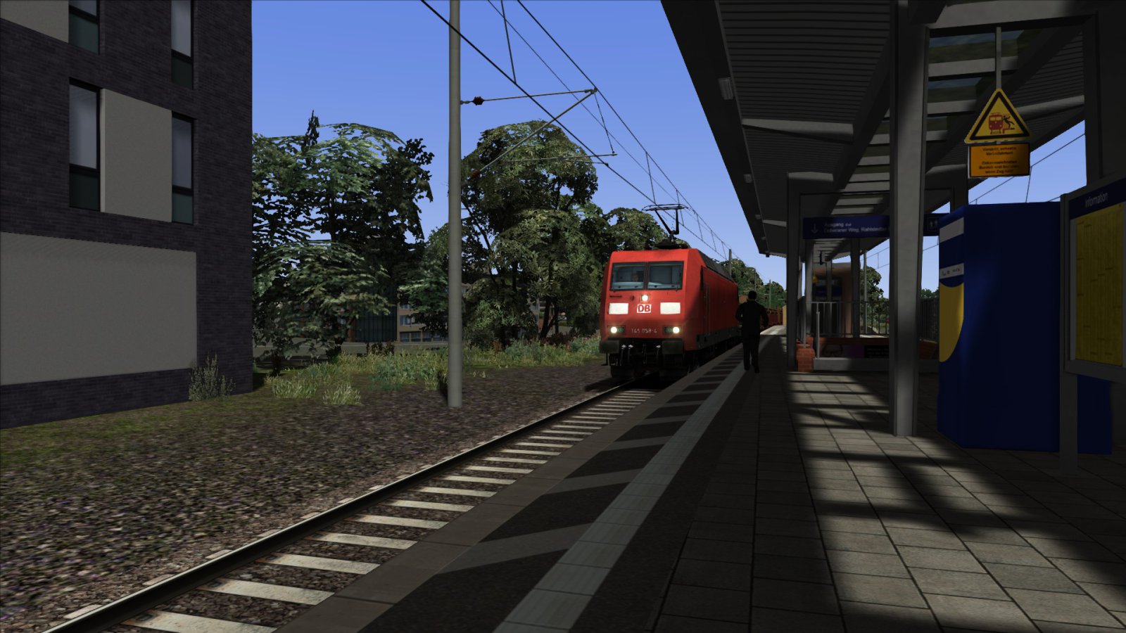 BR 145 met houttrein op station Hamburg Rahlstedt