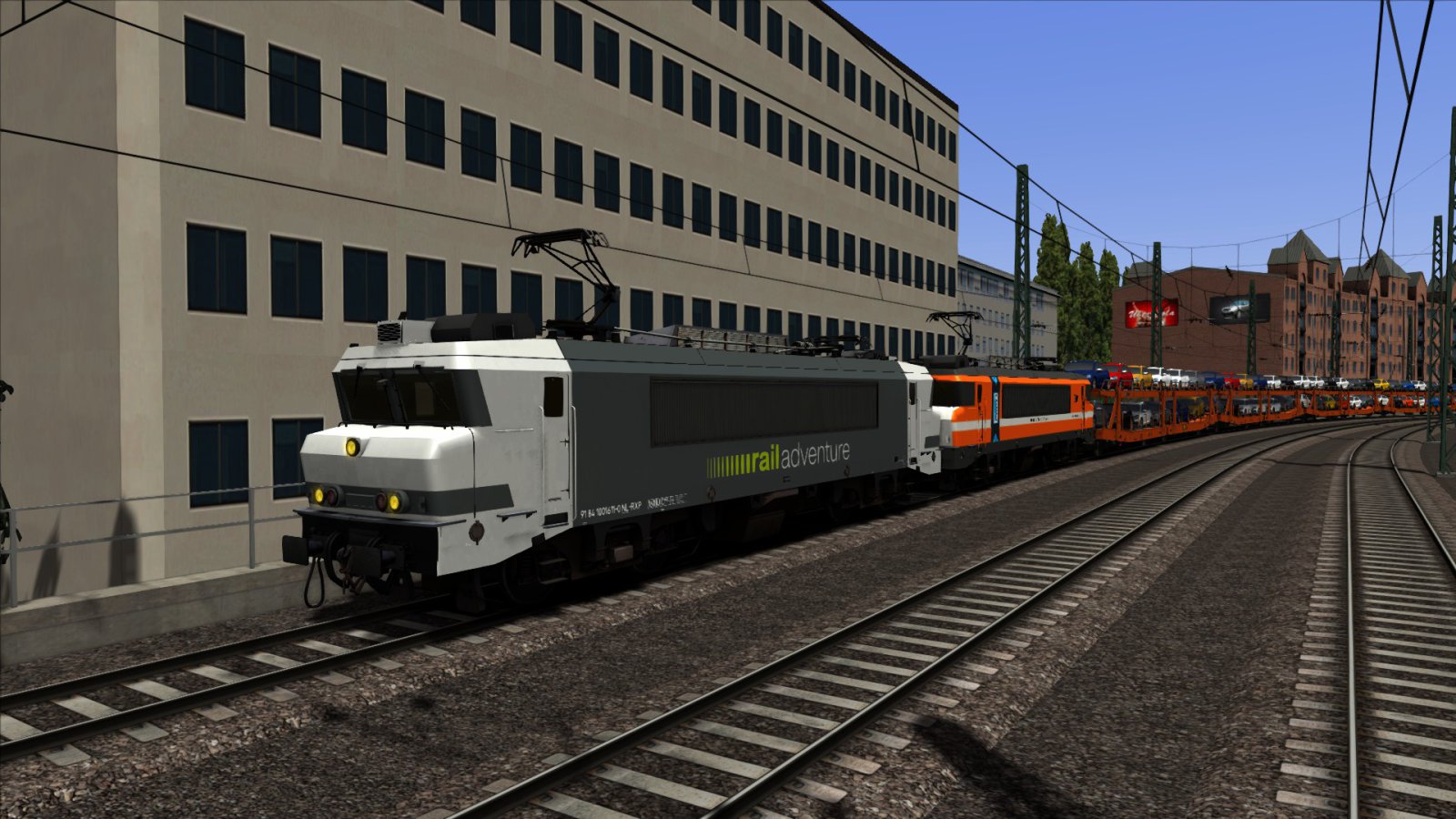Railexperts 9903 en 9901 vertrekken met een autotrein uit Hamburg Hbf